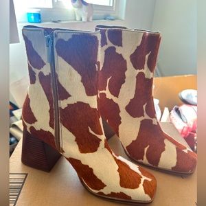 Steve Madden cow boots.